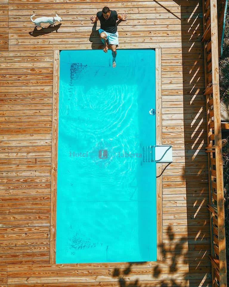 Hotel Libertad Lares Bagian luar foto